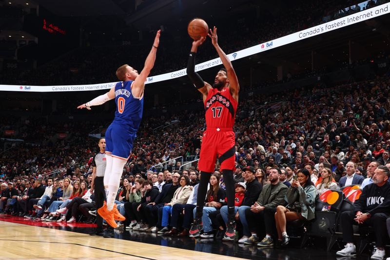 TORONTO, CANADA - MARCH 27: Garrett Temple #17 of the Toronto Raptors shoots the ball during the game against the New York Knicks on March 27, 2024 at the Scotiabank Arena in Toronto, Ontario, Canada.  NOTE TO USER: User expressly acknowledges and agrees that, by downloading and or using this Photograph, user is consenting to the terms and conditions of the Getty Images License Agreement.  Mandatory Copyright Notice: Copyright 2024 NBAE (Photo by Vaughn Ridley/NBAE via Getty Images)