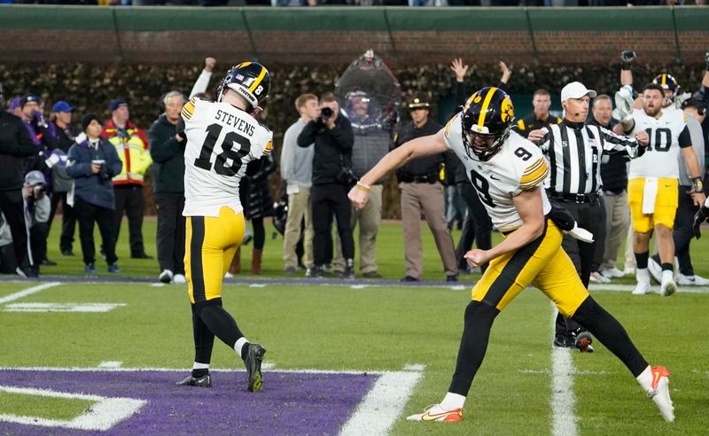 Nov 4, 2023; Chicago, Illinois, USA; Iowa Hawkeyes place kicker Drew Stevens (18) celebrates the game winning field goal against the Northwestern Wildcats during the second half at Wrigley Field. Mandatory Credit: David Banks-USA TODAY Sports