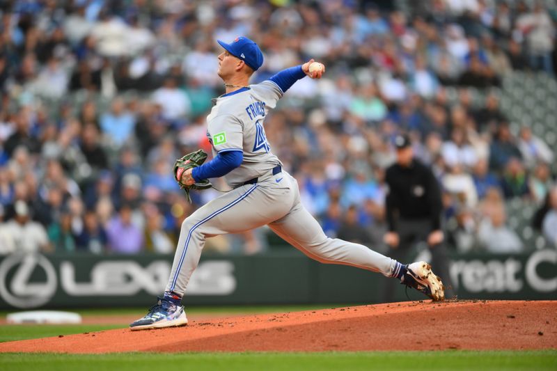 May 10, 2025; Seattle, Washington, USA; Toronto Blue Jays starting pitcher Bowden Francis (44) pitches to the Seattle Mariners during the first inning at T-Mobile Park. Mandatory Credit: Steven Bisig-Imagn Images