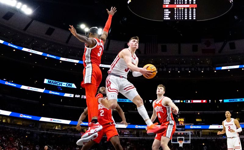 Mar 8, 2023; Chicago, IL, USA; Ohio State Buckeyes guard Eugene Brown III (3) shoots against Wisconsin Badgers guard Connor Essegian (3) during the second half at United Center. Mandatory Credit: David Banks-USA TODAY Sports