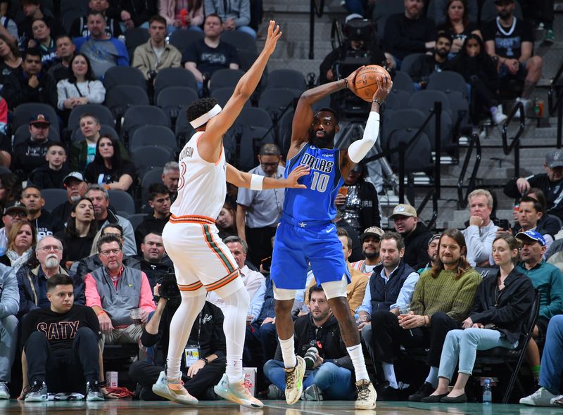 SAN ANTONIO, TX - MARCH 19: Tim Hardaway Jr. #10 of the Dallas Mavericks handles the ball against Keldon Johnson #3 of the San Antonio Spurs during the game on March 19, 2024 at the Frost Bank Center in San Antonio, Texas. NOTE TO USER: User expressly acknowledges and agrees that, by downloading and or using this photograph, user is consenting to the terms and conditions of the Getty Images License Agreement. Mandatory Copyright Notice: Copyright 2024 NBAE (Photos by Michael Gonzales/NBAE via Getty Images)