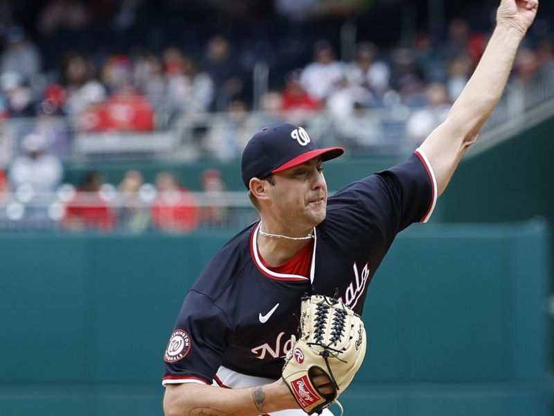 Apr 21, 2024; Washington, District of Columbia, USA; Washington Nationals starting pitcher Mitchell Parker (70) pitches against the Houston Astros during the first inning at Nationals Park. Mandatory Credit: Geoff Burke-USA TODAY Sports