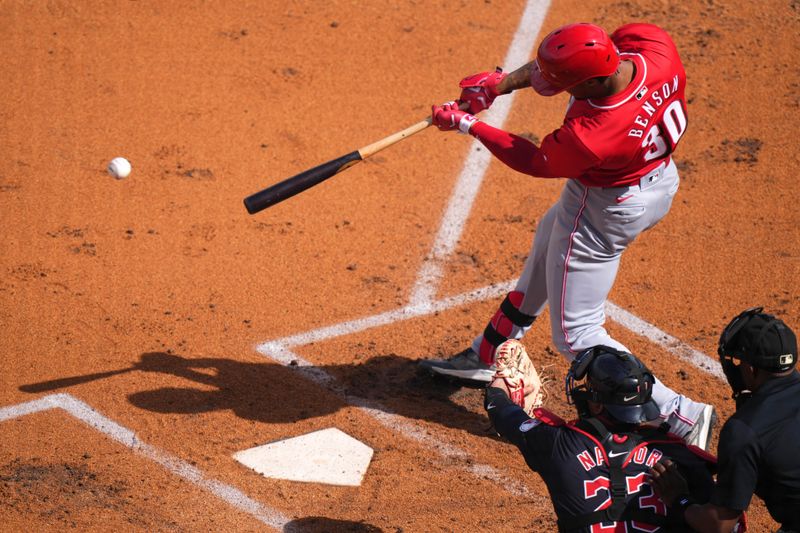 Feb. 24, 2024; Goodyear, Arizona, USA; Cincinnati Reds outfielder Will Benson (30) swings a pitch in the second inning during a MLB spring training game against the Cleveland Guardians at Goodyear Ballpark. Mandatory Credit: Kareem Elgazzar-USA TODAY Sports