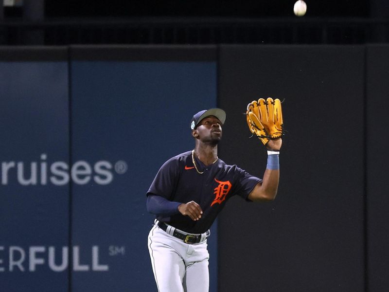 Feb 27, 2023; Tampa, Florida, USA; Detroit Tigers outfielder Jonathan Davis (39) catches a fly ball during the second inning against the New York Yankees at George M. Steinbrenner Field. Mandatory Credit: Kim Klement-USA TODAY Sports