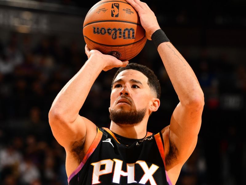 PHOENIX, AZ - NOVEMBER 26: Devin Booker #1 of the Phoenix Suns shoots the ball during the game against the Los Angeles Lakers during the Emirates NBA Cup game on November 26, 2024 at Footprint Center in Phoenix, Arizona. NOTE TO USER: User expressly acknowledges and agrees that, by downloading and or using this photograph, user is consenting to the terms and conditions of the Getty Images License Agreement. Mandatory Copyright Notice: Copyright 2024 NBAE (Photo by Barry Gossage/NBAE via Getty Images)