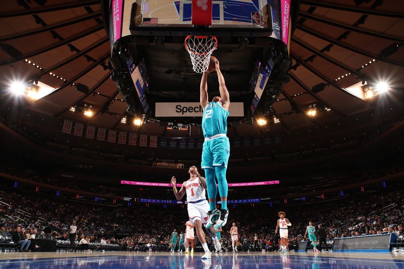 NEW YORK, NY - OCTOBER 15: Grant Williams #2 of the Charlotte Hornets dunks the ball during the game against the New York Knicks during the 2024 NBA Preseason on October 15, 2024 at Madison Square Garden in New York City, New York.  NOTE TO USER: User expressly acknowledges and agrees that, by downloading and or using this photograph, User is consenting to the terms and conditions of the Getty Images License Agreement. Mandatory Copyright Notice: Copyright 2024 NBAE  (Photo by Nathaniel S. Butler/NBAE via Getty Images)