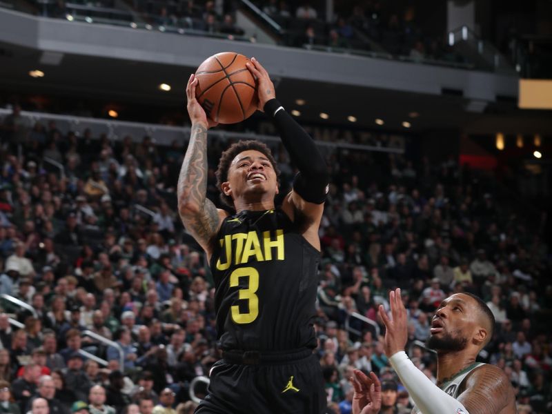 MILWAUKEE, WI - NOVEMBER 7: Keyonte George #3 of the Utah Jazz drives to the basket during the game against the Milwaukee Bucks on November 7, 2024 at Fiserv Forum Center in Milwaukee, Wisconsin. NOTE TO USER: User expressly acknowledges and agrees that, by downloading and or using this Photograph, user is consenting to the terms and conditions of the Getty Images License Agreement. Mandatory Copyright Notice: Copyright 2024 NBAE (Photo by Gary Dineen/NBAE via Getty Images).