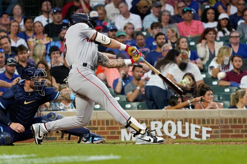 Jul 14, 2023; Chicago, Illinois, USA; Boston Red Sox left fielder Jarren Duran (16) hits a double against the Chicago Cubs during the third inning at Wrigley Field. Mandatory Credit: David Banks-USA TODAY Sports