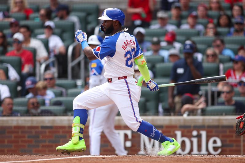 May 31, 2025; Atlanta, Georgia, USA; Atlanta Braves center fielder Michael Harris II (23) hits an infield single against the Boston Red Sox in the second inning at Truist Park. Mandatory Credit: Brett Davis-Imagn Images