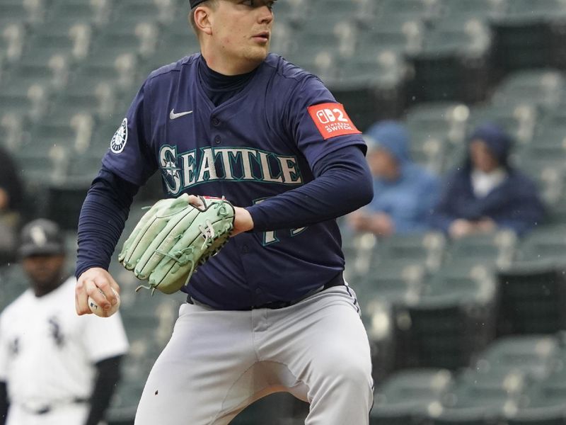 May 21, 2025; Chicago, Illinois, USA; Seattle Mariners pitcher Logan Evans (73) throws the ball against the Chicago White Sox during the first inning at Rate Field. Mandatory Credit: David Banks-Imagn Images