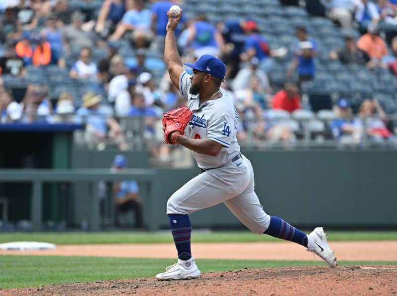 Jul 2, 2023; Kansas City, Missouri, USA;  Los Angeles Dodgers third baseman Yonny Hernandez (60) delivers a pitch in the ninth inning against the Kansas City Royals at Kauffman Stadium. Mandatory Credit: Peter Aiken-USA TODAY Sports