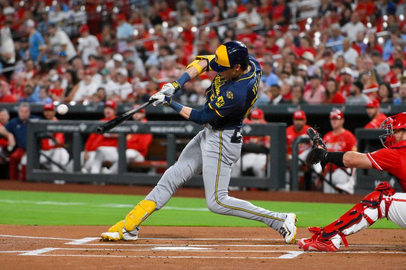 Sep 19, 2025; St. Louis, Missouri, USA;  Milwaukee Brewers designated hitter Christian Yelich (22) hits a single against the St. Louis Cardinals during the first inning at Busch Stadium. Mandatory Credit: Jeff Curry-Imagn Images
