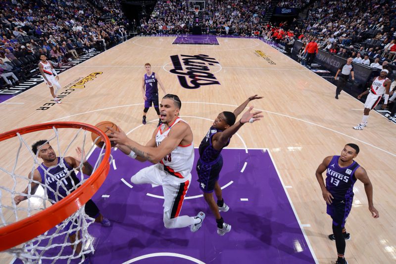 SACRAMENTO, CA - OCTOBER 28: Toumani Camara #33 of the Portland Trail Blazers drives to the basket during the game against the Sacramento Kings on October 28, 2024 at Golden 1 Center in Sacramento, California. NOTE TO USER: User expressly acknowledges and agrees that, by downloading and or using this Photograph, user is consenting to the terms and conditions of the Getty Images License Agreement. Mandatory Copyright Notice: Copyright 2024 NBAE (Photo by Rocky Widner/NBAE via Getty Images)