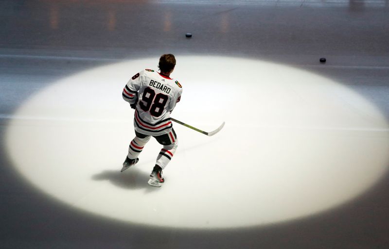 Oct 10, 2023; Pittsburgh, Pennsylvania, USA; Chicago Blackhawks center Connor Bedard (98) takes the ice to warm up before making his NHL debut against the Pittsburgh Penguins at the PPG Paints Arena. Mandatory Credit: Charles LeClaire-USA TODAY Sports