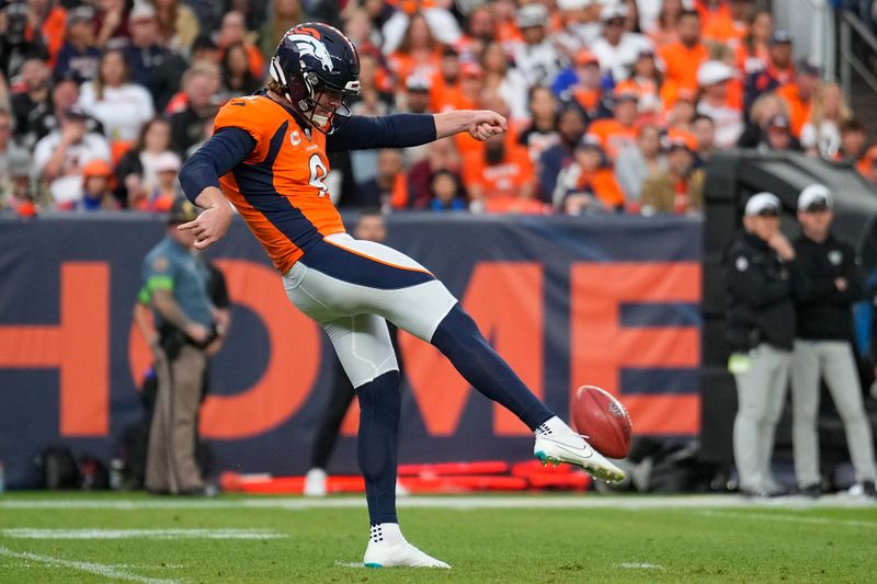 Denver Broncos punter Riley Dixon punts against the Las Vegas Raiders during an NFL football game Sunday, Sept. 10, 2023, in Denver. (AP Photo/Jack Dempsey)