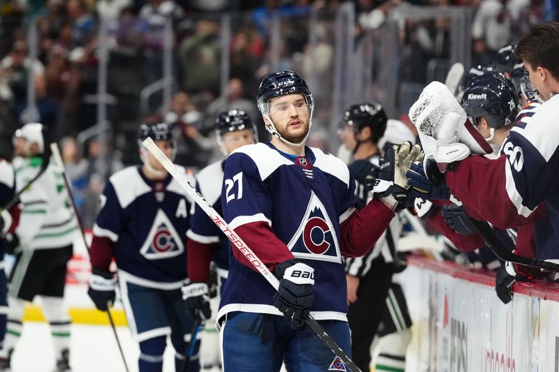 Apr 7, 2024; Denver, Colorado, USA; Colorado Avalanche left wing Jonathan Drouin (27) celebrates his third period goal against the Dallas Stars at Ball Arena. Mandatory Credit: Ron Chenoy-USA TODAY Sports