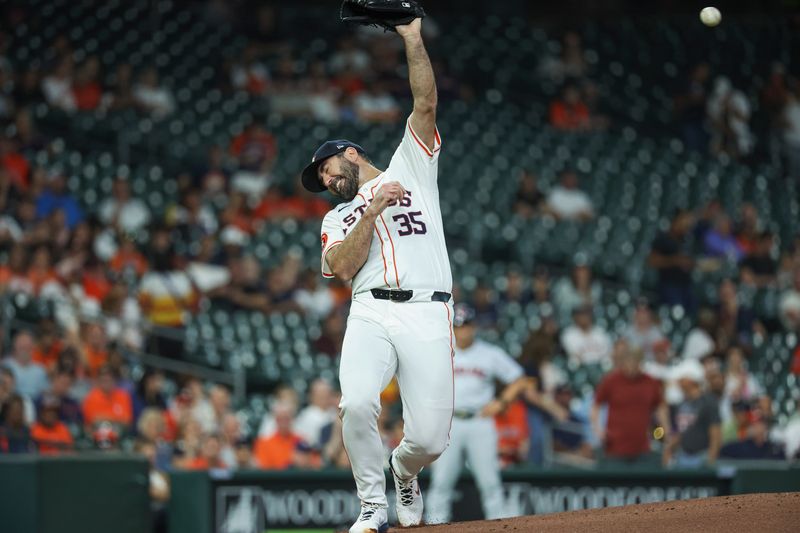 May 1, 2024; Houston, Texas, USA;  Houston Astros starting pitcher Justin Verlander (35) reacts on a single hit by Cleveland Guardians left fielder Steven Kwan (not pictured) during the first inning at Minute Maid Park. Mandatory Credit: Troy Taormina-USA TODAY Sports