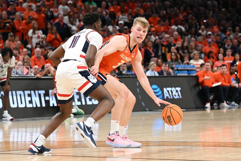 Mar 30, 2024; Boston, MA, USA; Illinois Fighting Illini forward Marcus Domask (3) dribbles the ball against Connecticut Huskies guard Tristen Newton (2) in the finals of the East Regional of the 2024 NCAA Tournament at TD Garden. Mandatory Credit: Brian Fluharty-USA TODAY Sports