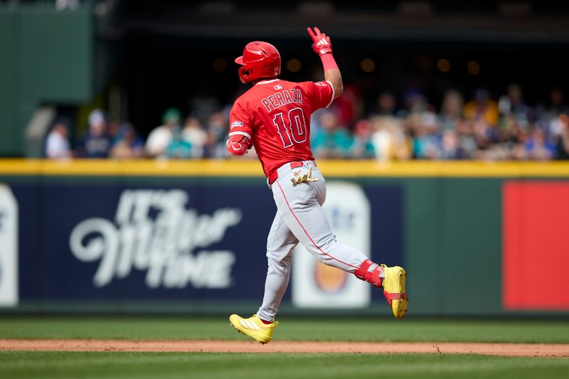 Sep 14, 2025; Seattle, Washington, USA; Los Angeles Angels third base Oswald Peraza (10) rounds the bases on a solo home run during the sixth inning against the Seattle Mariners at T-Mobile Park. Mandatory Credit: John Froschauer-Imagn Images