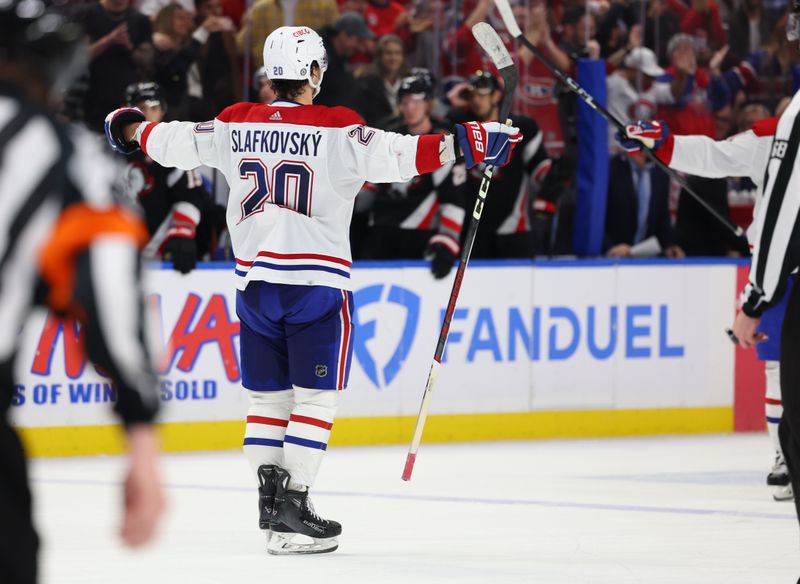 Dec 9, 2023; Buffalo, New York, USA;  Montreal Canadiens left wing Juraj Slafkovsky (20) reacts after scoring the game winning goal in a shootout against the Buffalo Sabres at KeyBank Center. Mandatory Credit: Timothy T. Ludwig-USA TODAY Sports