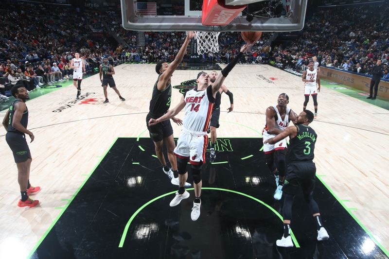 NEW ORLEANS, LA - FEBRUARY 23: Tyler Herro #14 of the Miami Heat shoots the ball during the game against the New Orleans Pelicans on February 23, 2024 at the Smoothie King Center in New Orleans, Louisiana. NOTE TO USER: User expressly acknowledges and agrees that, by downloading and or using this Photograph, user is consenting to the terms and conditions of the Getty Images License Agreement. Mandatory Copyright Notice: Copyright 2024 NBAE (Photo by Layne Murdoch Jr./NBAE via Getty Images)