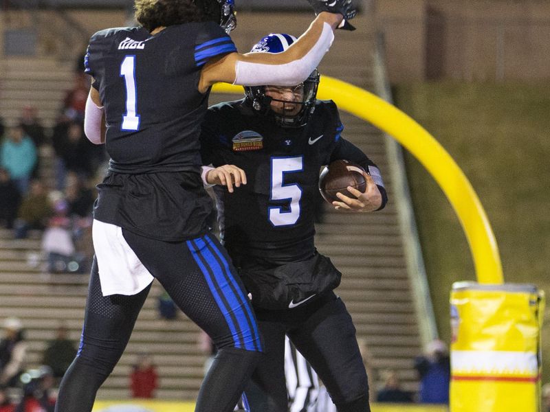 Dec 17, 2022; Albuquerque, New Mexico, USA; Brigham Young Cougars quarterback Sol-Jay Maiava-Peters (5) celebrates with wide receiver Keanu Hill (1) after a running touchdown against the Southern Methodist Mustangs during the first half at University Stadium (Albuquerque). Mandatory Credit: Ivan Pierre Aguirre-USA TODAY Sports