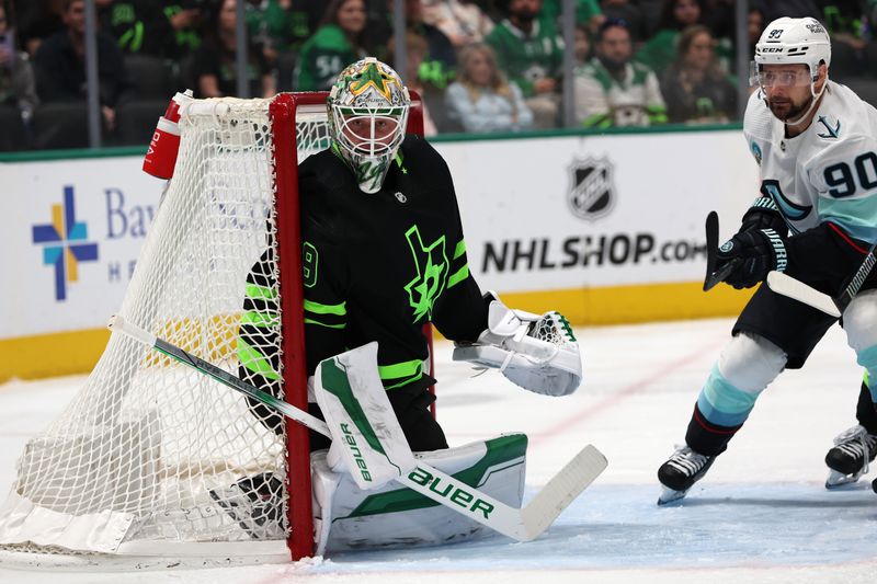 Apr 13, 2024; Dallas, Texas, USA; Dallas Stars goaltender Jake Oettinger (29) plays defense in the third period against the Seattle Kraken at American Airlines Center. Mandatory Credit: Tim Heitman-USA TODAY Sports