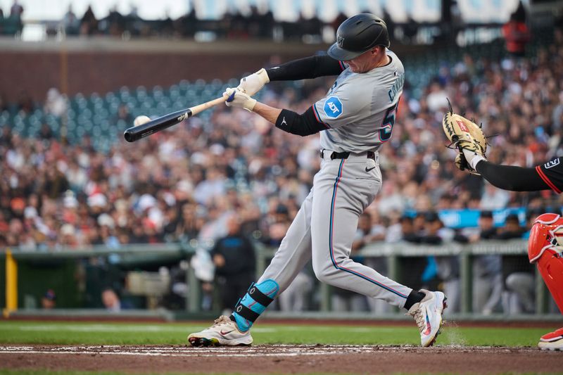 Aug 31, 2024; San Francisco, California, USA; Miami Marlins outfielder Griffin Conine (56) hits a two-run home run against the San Francisco Giants during the second inning at Oracle Park. Mandatory Credit: Robert Edwards-USA TODAY Sports