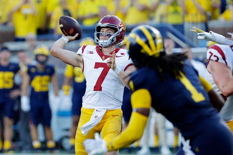 Sep 21, 2024; Ann Arbor, Michigan, USA;  USC Trojans quarterback Miller Moss (7) passes in the second half against the Michigan Wolverines at Michigan Stadium. Mandatory Credit: Rick Osentoski-Imagn Images