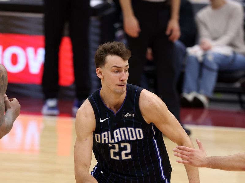 CLEVELAND, OH - APRIL 20: Franz Wagner #22 of the Orlando Magic handles the ball during Round One Game One of the 2024 NBA Playoffs against the Cleveland Cavaliers on April 20, 2024 at Rocket Mortgage FieldHouse in Cleveland, Ohio. NOTE TO USER: User expressly acknowledges and agrees that, by downloading and/or using this Photograph, user is consenting to the terms and conditions of the Getty Images License Agreement. Mandatory Copyright Notice: Copyright 2024 NBAE (Photo by  Lauren Leigh Bacho/NBAE via Getty Images)