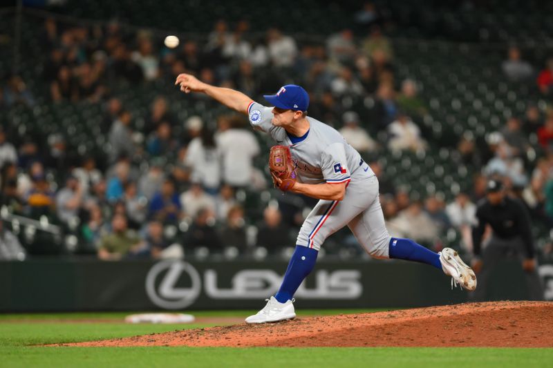 Sep 12, 2024; Seattle, Washington, USA; Texas Rangers relief pitcher David Robertson (37) pitches to the Seattle Mariners during the eighth inning at T-Mobile Park. Mandatory Credit: Steven Bisig-Imagn Images