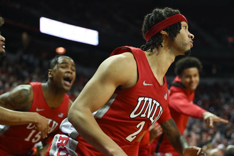 Jan 28, 2023; Las Vegas, Nevada, USA; UNLV Runnin' Rebels guard Justin Webster (2) hits a shot in against the Nevada Wolf Pack in the second half at Thomas & Mack Center. Mandatory Credit: Candice Ward-USA TODAY Sports