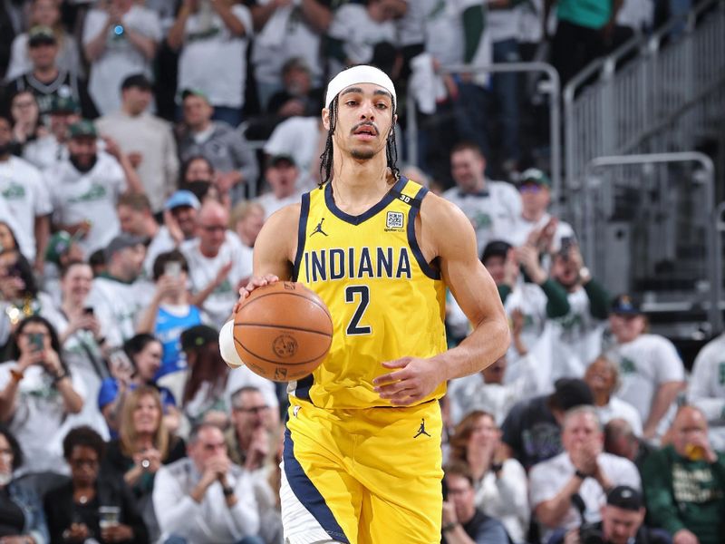 MILWAUKEE, WI - APRIL 23: Andrew Nembhard #2 of the Indiana Pacers brings the ball up court during Round 1 Game 2 of the 2024 NBA Playoffs against the Milwaukee Bucks on April 23, 2024 at the Fiserv Forum Center in Milwaukee, Wisconsin. NOTE TO USER: User expressly acknowledges and agrees that, by downloading and or using this Photograph, user is consenting to the terms and conditions of the Getty Images License Agreement. Mandatory Copyright Notice: Copyright 2024 NBAE (Photo by Jeff Haynes/NBAE via Getty Images).