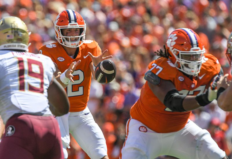 Sep 23, 2023; Clemson, South Carolina, USA; Clemson Tigers quarterback Cade Klubnik (2) takes a snap against the Florida State Seminoles during the first quarter at Memorial Stadium. Mandatory Credit: Ken Ruinard-USA TODAY Sports