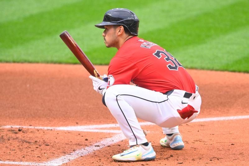 May 3, 2024; Cleveland, Ohio, USA; Cleveland Guardians left fielder Steven Kwan (38) stretches before batting in the first inning against the Los Angeles Angels at Progressive Field. Mandatory Credit: David Richard-USA TODAY Sports