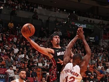 MIAMI, FL - DECEMBER 8: Jaime Jaquez Jr. #11 of the Miami Heat drives to the basket during the game against the Cleveland Cavaliers on December 8, 2023 at Kaseya Center in Miami, Florida. NOTE TO USER: User expressly acknowledges and agrees that, by downloading and or using this Photograph, user is consenting to the terms and conditions of the Getty Images License Agreement. Mandatory Copyright Notice: Copyright 2023 NBAE (Photo by Issac Baldizon/NBAE via Getty Images)