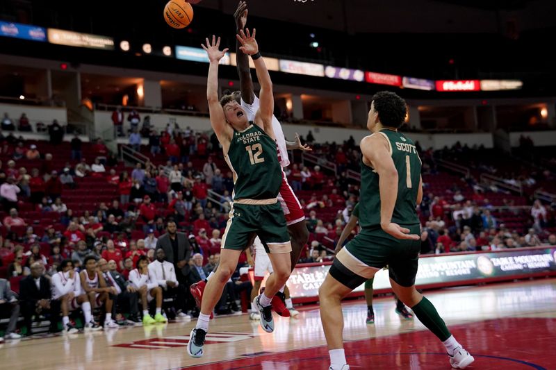 Feb 3, 2024; Fresno, California, USA; Colorado State Rams forward Patrick Cartier (12) attempts to gain control of a rebound against the Fresno State Bulldogs in the second half at the Save Mart Center. Mandatory Credit: Cary Edmondson-USA TODAY Sports