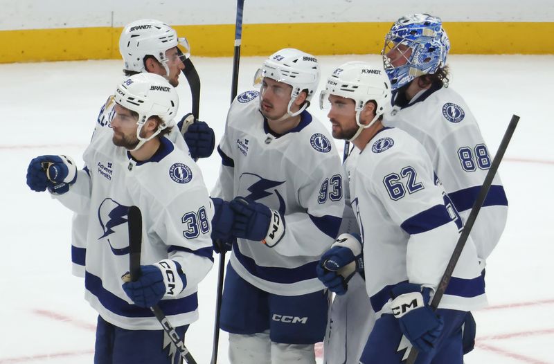 Jan 13, 2026; Pittsburgh, Pennsylvania, USA;  The Tampa Bay Lightning celebrate after defeating the Pittsburgh Penguins in a shootout at PPG Paints Arena. Mandatory Credit: Charles LeClaire-Imagn Images