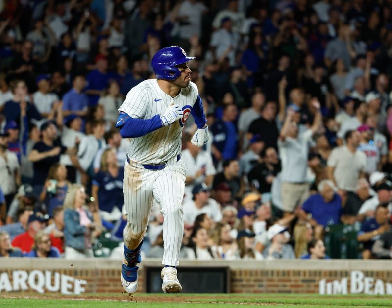 Jun 5, 2024; Chicago, Illinois, USA; Chicago Cubs outfielder Mike Tauchman (40) rounds the bases after hitting a walk-off home run against the Chicago White Sox during the ninth inning at Wrigley Field. Mandatory Credit: Kamil Krzaczynski-USA TODAY Sports