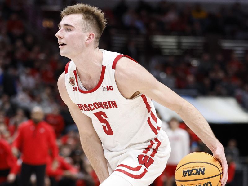 Mar 8, 2023; Chicago, IL, USA; Wisconsin Badgers forward Tyler Wahl (5) drives to the basket against the Ohio State Buckeyes during the second half at United Center. Mandatory Credit: Kamil Krzaczynski-USA TODAY Sports