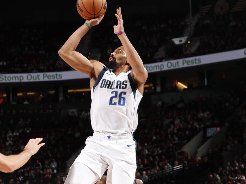 PORTLAND, OR - DECEMBER 1: Spencer Dinwiddie #26 of the Dallas Mavericks shoots the ball during the game against the Portland Trail Blazers on December 1, 2024 at the Moda Center Arena in Portland, Oregon. NOTE TO USER: User expressly acknowledges and agrees that, by downloading and or using this photograph, user is consenting to the terms and conditions of the Getty Images License Agreement. Mandatory Copyright Notice: Copyright 2024 NBAE (Photo by Cameron Browne/NBAE via Getty Images)