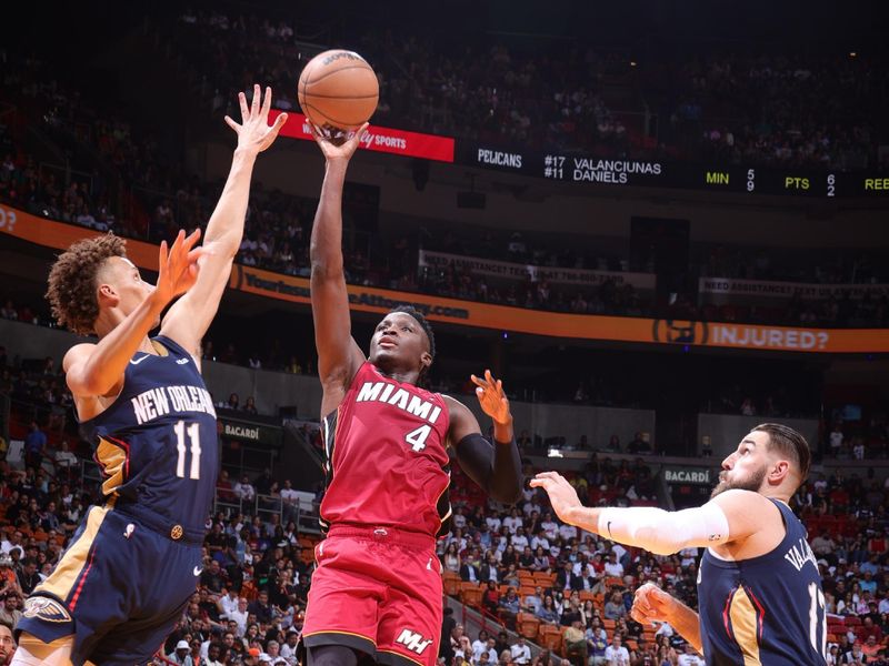 MIAMI, FL - JANUARY 22: Victor Oladipo #4 of the Miami Heat shoots the ball during the game against the New Orleans Pelicans on January 22, 2023 at Miami-Dade Arena in Miami, Florida. NOTE TO USER: User expressly acknowledges and agrees that, by downloading and or using this Photograph, user is consenting to the terms and conditions of the Getty Images License Agreement. Mandatory Copyright Notice: Copyright 2023 NBAE (Photo by Nathaniel S. Butler/NBAE via Getty Images)