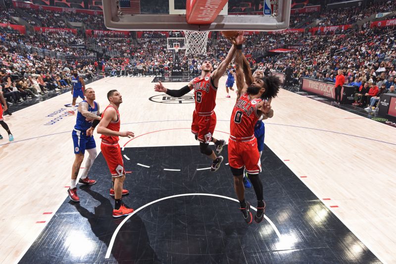 LOS ANGELES, CA - MARCH 9: Alex Caruso #6 of the Chicago Bulls grabs a rebound during the game against the LA Clippers on March 9, 2024 at Crypto.Com Arena in Los Angeles, California. NOTE TO USER: User expressly acknowledges and agrees that, by downloading and/or using this Photograph, user is consenting to the terms and conditions of the Getty Images License Agreement. Mandatory Copyright Notice: Copyright 2024 NBAE (Photo by Adam Pantozzi/NBAE via Getty Images)