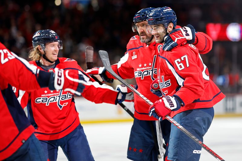 Feb 26, 2024; Washington, District of Columbia, USA; Washington Capitals left wing Max Pacioretty (67) celebrates with teammates after scoring a goal against the Ottawa Senators in the first period at Capital One Arena. Mandatory Credit: Geoff Burke-USA TODAY Sports