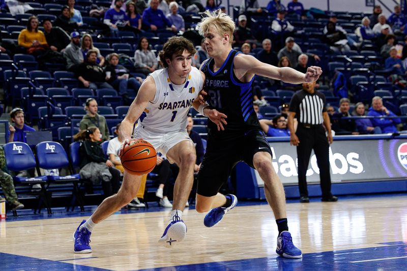 Jan 13, 2024; Colorado Springs, Colorado, USA; San Jose State Spartans guard Garrett Anderson (1) controls the ball as Air Force Falcons forward Rytis Petraitis (31) guards in the second half at Clune Arena. Mandatory Credit: Isaiah J. Downing-USA TODAY Sports