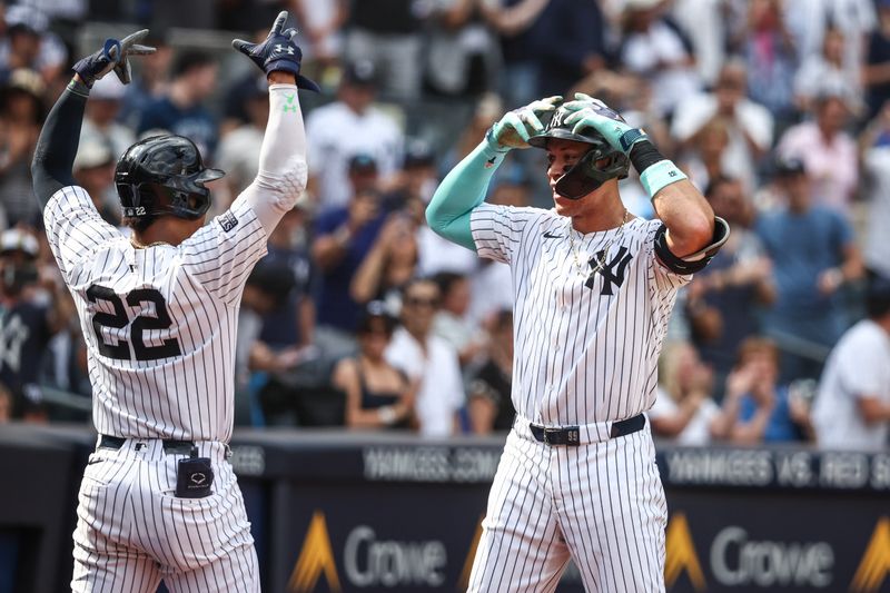 Aug 25, 2024; Bronx, New York, USA;  New York Yankees center fielder Aaron Judge (99) celebrates with right fielder Juan Soto (22) after hitting a solo home run in the seventh inning against the Colorado Rockies at Yankee Stadium. Mandatory Credit: Wendell Cruz-USA TODAY Sports