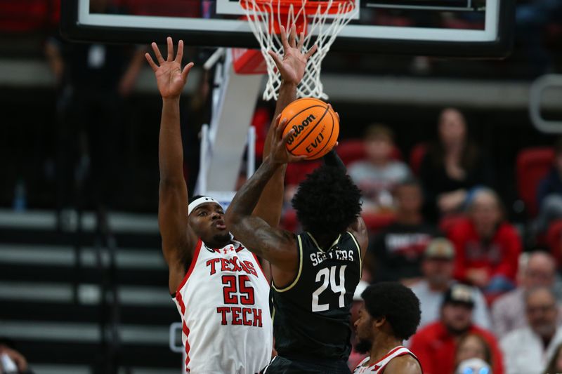 Feb 10, 2024; Lubbock, Texas, USA; Central Florida Knights guard Jaylin Sellers (24) shoots over Texas Tech Red Raiders forward Robert Jennings (25) in the first half United Supermarkets Arena. Mandatory Credit: Michael C. Johnson-USA TODAY Sports