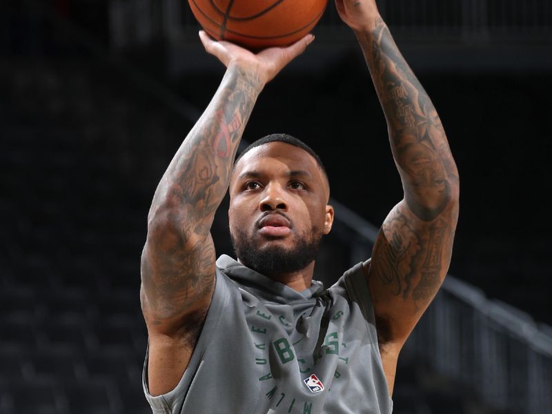 MILWAUKEE, WI - NOVEMBER 20: Damian Lillard #0 of the Milwaukee Bucks warms up before the game against the Chicago Bulls on November 20, 2024 at the Fiserv Forum Center in Milwaukee, Wisconsin. NOTE TO USER: User expressly acknowledges and agrees that, by downloading and or using this Photograph, user is consenting to the terms and conditions of the Getty Images License Agreement. Mandatory Copyright Notice: Copyright 2024 NBAE (Photo by Gary Dineen/NBAE via Getty Images).