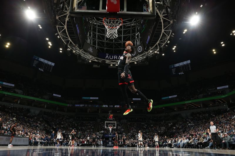 MINNEAPOLIS, MN -  FEBRUARY 4: Jalen Green #4 of the Houston Rockets dunks the ball during the game against the Minnesota Timberwolves on February 4, 2024 at Target Center in Minneapolis, Minnesota. NOTE TO USER: User expressly acknowledges and agrees that, by downloading and or using this Photograph, user is consenting to the terms and conditions of the Getty Images License Agreement. Mandatory Copyright Notice: Copyright 2024 NBAE (Photo by David Sherman/NBAE via Getty Images)