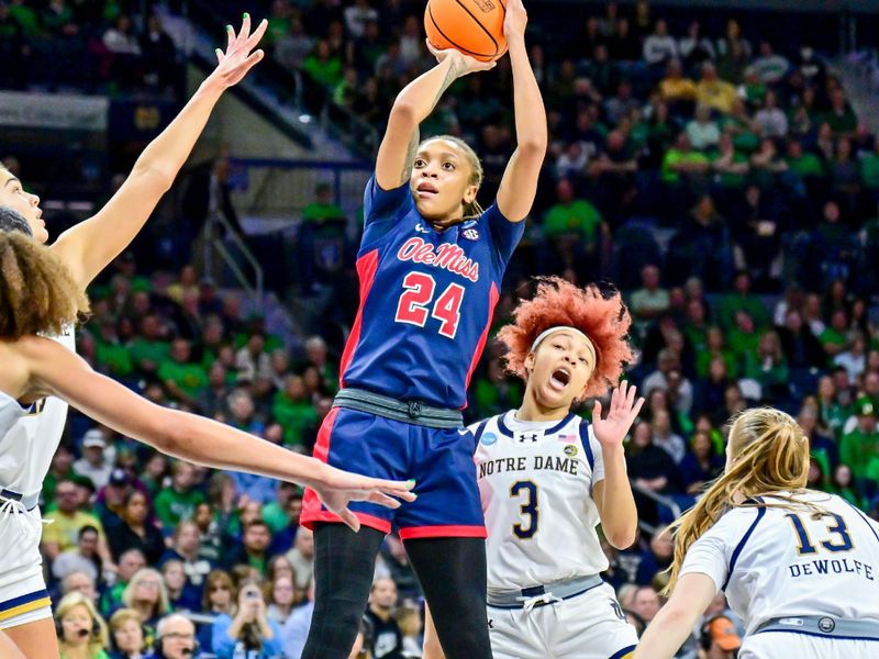 Mar 25, 2024; South Bend, Indiana, USA; Ole Miss Rebels forward Madison Scott (24) shoots as Notre Dame Fighting Irish guard Hannah Hidalgo (3) defends in the second half of the NCAA Tournament second round game at the Purcell Pavilion. Mandatory Credit: Matt Cashore-USA TODAY Sports